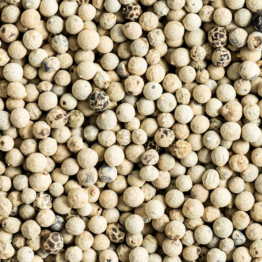 a lot of whole white peppercorns